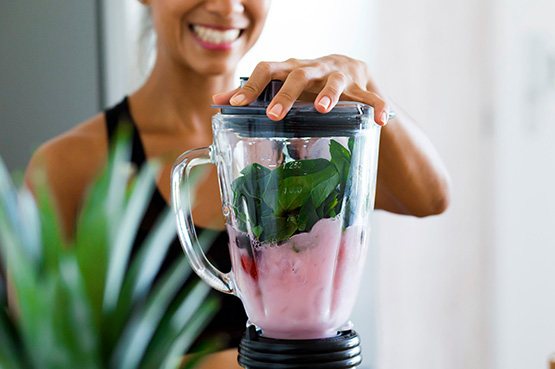 a dental patient making a smoothie