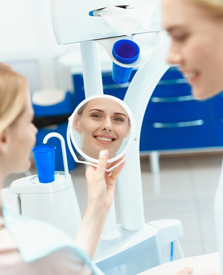 A dental patient and dentist chatting