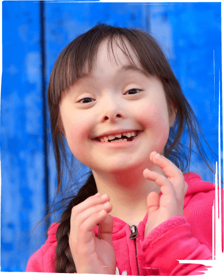 Young girl with special needs smiling
