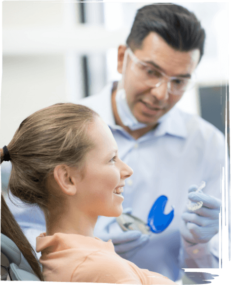 Dentist showing Invisalign to a patient