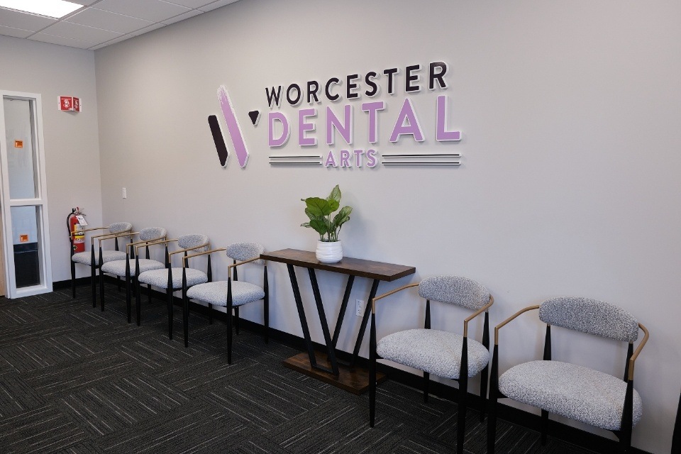 Sign outside of building that reads Worcester Dental Arts Coming Soon