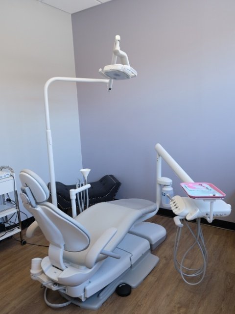 Dental exam chair next to a window